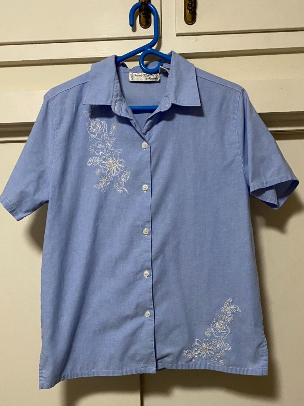 Sarah Bentley, short sleeve, blue button-down blouse w/embroidery, size M